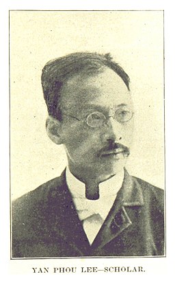 Portrait of Yan Phou Lee wearing round spectacles and a moustache.